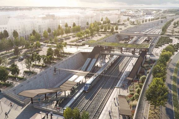 Vy över framtida stationsområde med nya dubbelspår och med plattformar i nedsänkt läge. Illustration: 10A/Visulent